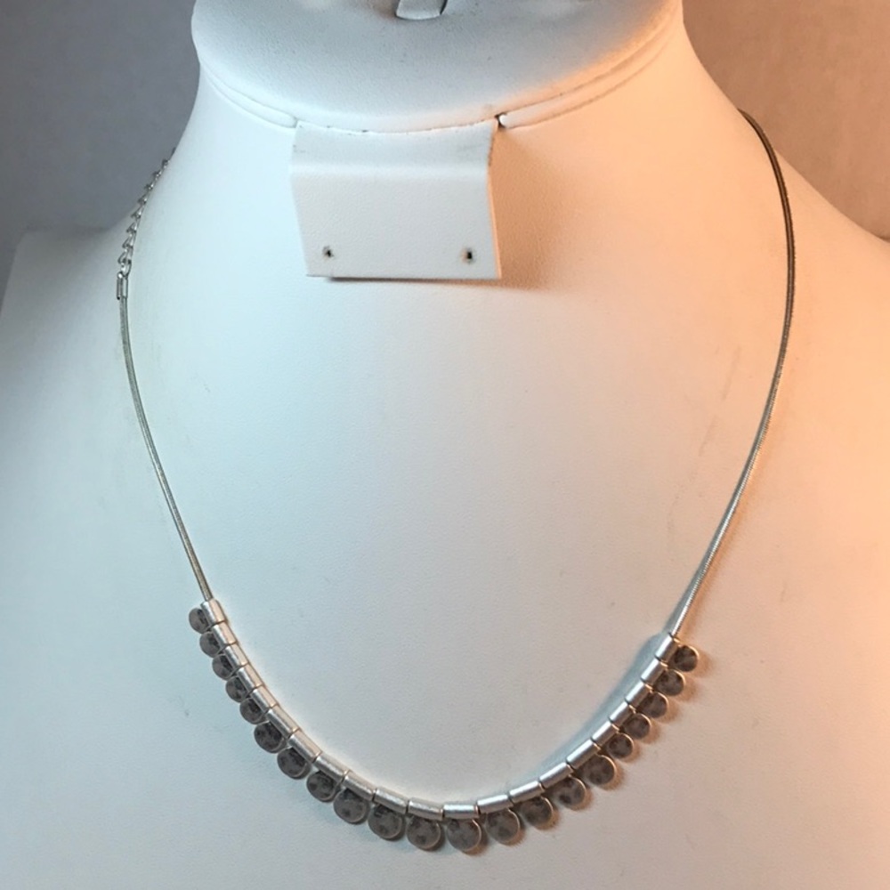 Brushed silver tone necklace, 8 in length + 3 in extender, has crown sym…